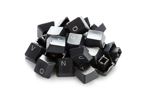 A pile of computer keyboard keys isolated on a white background Stock Photos
