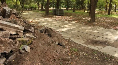 Pile of the construction debrits in a park zone Video stock 69060959