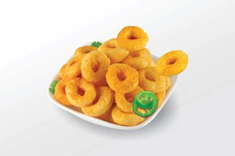 Pile of crispy Corn ring, Cream &amp; Onion snack (Fryums - Frymus) in white dish Stock Photos