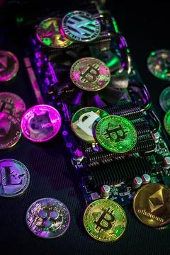 Pile of cryptocurrencies on videocard Stock Photos