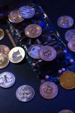 Pile of cryptocurrencies on videocard Stock Photos