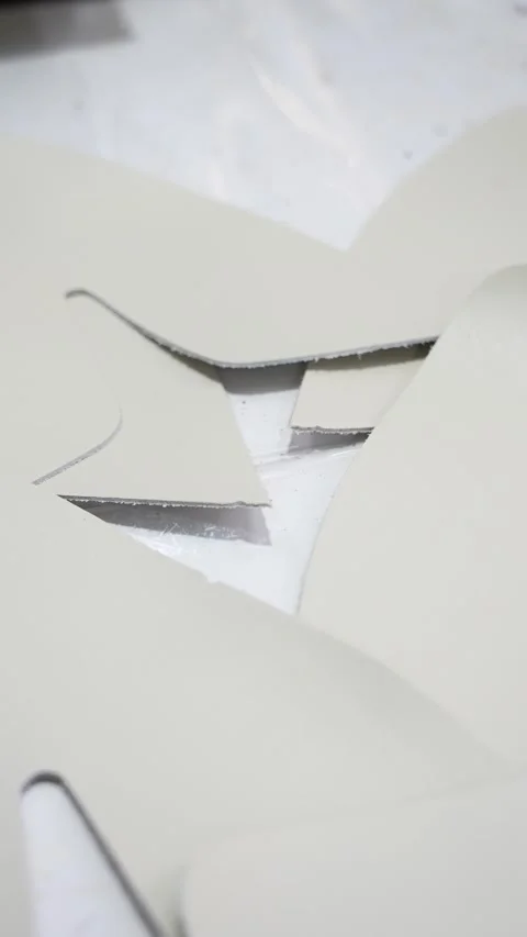 Pile of Cut Synthetic Material Components in Factory Vertical Vidéo 340182696