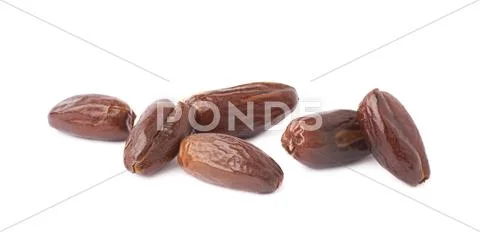 Pile of date fruits over isolated white background surface Stock Photos