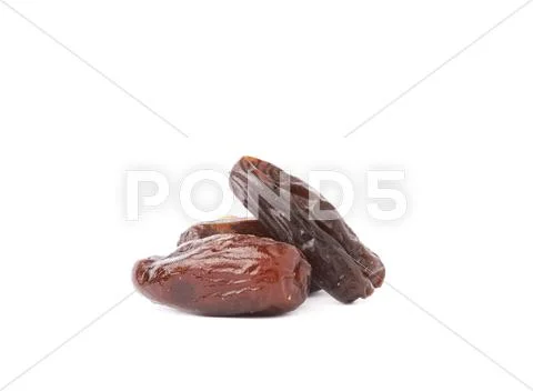 Pile of date fruits over isolated white background surface Stock Photos