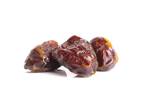 Pile of dates isolated on white background. Arabic food Stock Photos