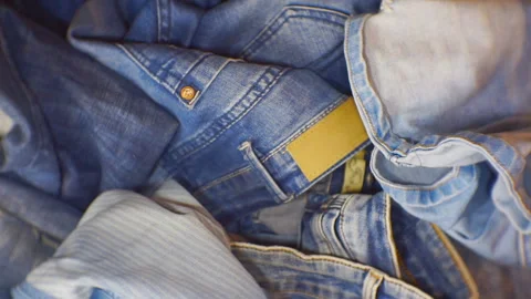 Pile of denim clothes as a background. Stock Footage 101479455