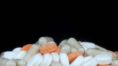 A pile of different pills rotates Video stock 146680252