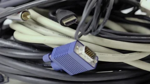 Pile of different video cables, wires, connectors and plugs Stock Footage 276376066
