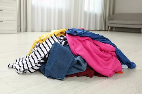 pile of clothes on floor