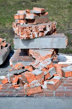 Pile of discarded bricks from construction site Stock Photos
