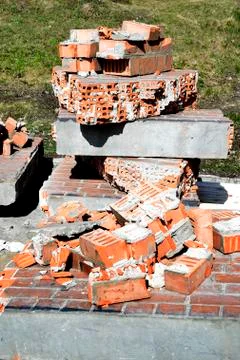 Pile of discarded bricks from construction site Stock Photos