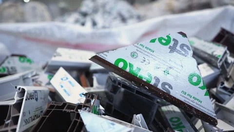 Pile of discarded materials includes fragments bearing labels Stock Footage 306668974