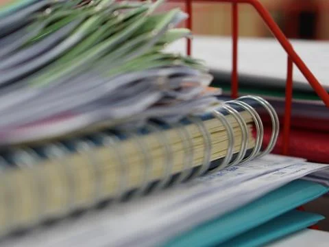 Pile of documents and notebook in office Stock Photos