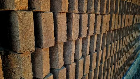 A pile of dried clay bricks Stock Photos