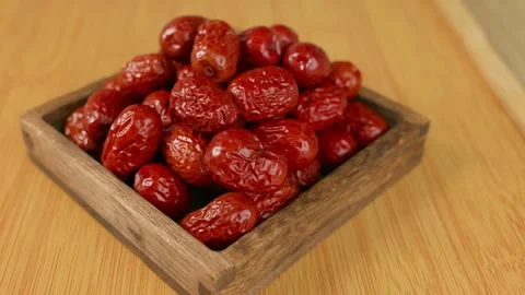 Pile of dried red jujubes. Nutritious and delicious red Chinese jujube fruits. 스톡 동영상 340310474