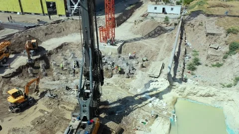 Pile drilling machine for foundation at construction site Stock Footage 219425339