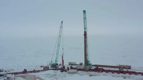 The pile driver drives the pile into the ground. Stock Footage 154202431