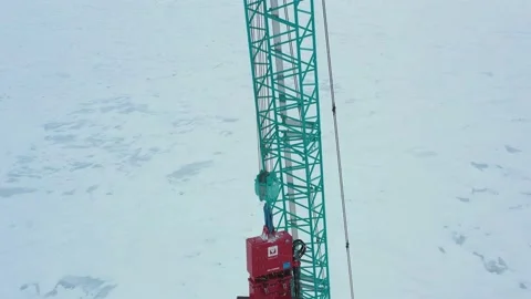 The pile driver drives the pile into the ground. Stock Footage 154202452