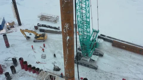 The pile driver drives the pile into the ground. Stock Footage 154202463