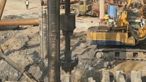 The pile driver hammers the pile. Stock Footage 187579682
