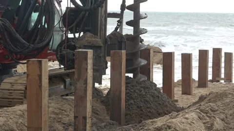Pile Driver Working Beside The Ocean 6 of 7 Stock Footage 253505517
