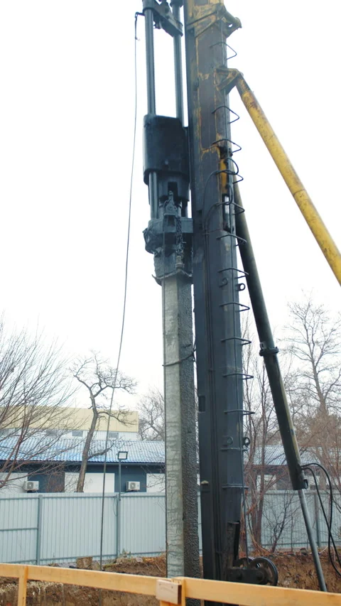 Pile Driving Machine in Action at Construction Site Stock Footage 296755004