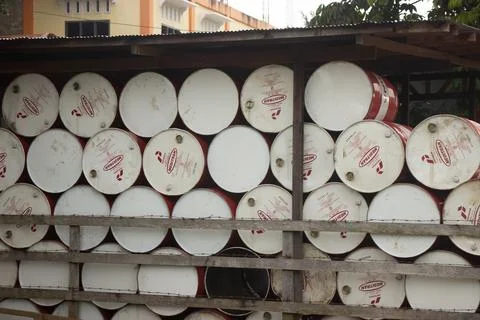 A pile of drums in a dumpster Stock Photos