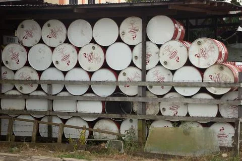 A pile of drums in a dumpster Foto stock