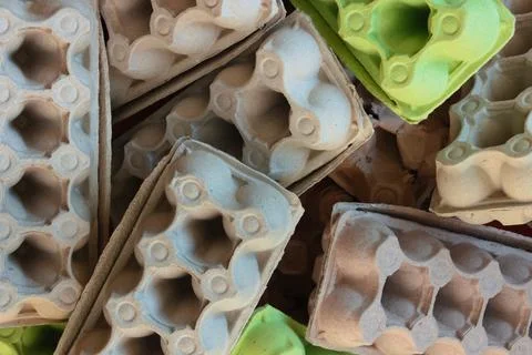 Pile of empty cardboard egg containers ready for recycling Stock Photos