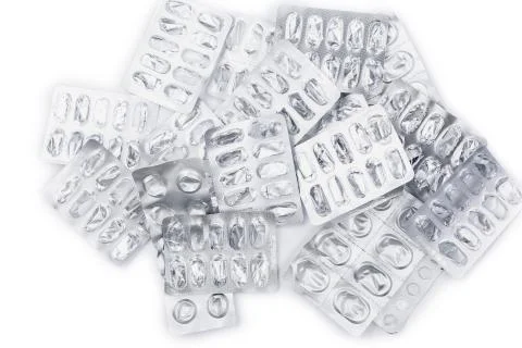 Pile of empty packing from tablets on white background Stock Photos