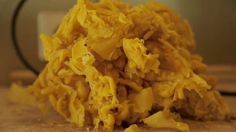 Pile of excess beewax Stock Footage 74056921