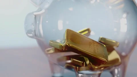 Pile of fine gold ingots inside glass piggybank Видео 265440938