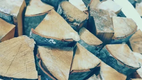 A pile of firewood close-up, dry logs, vertical video Stock Footage