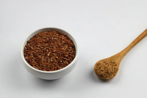 Pile of flax seeds isolated on white background Stock Photos