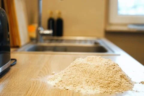 Pile flour kitchen table counter ready for cooking preparation pastry homemade Stock Photos