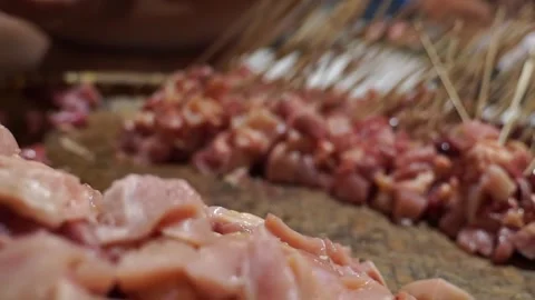Pile the focus on the chicken meat until you don't focus on the chicken meat Stock Footage 270347194