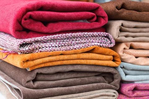 Pile of folded textile Stock Photos