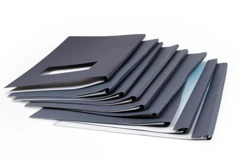 Pile of folders on plain background Stock Photos