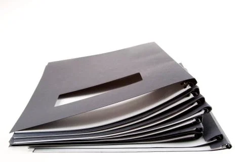 Pile of folders on plain background Stock Photos