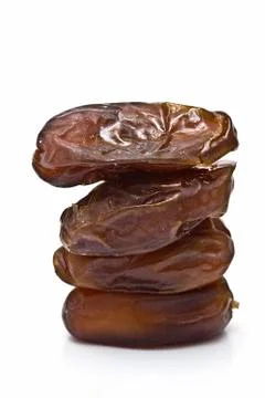A pile of four dates. Stock Photos