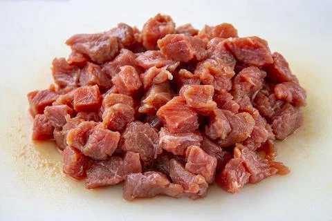 Pile of Fresh Diced Raw Beef Cubes Stock Photos