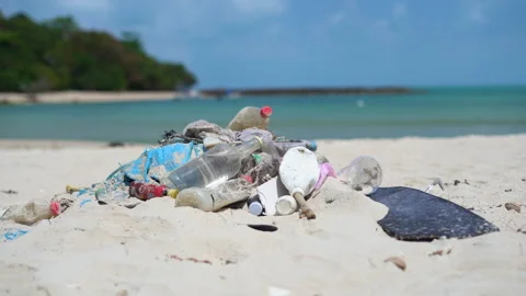 Pile of garbage on the background of a beautiful tropical beach Stock Footage 236699008