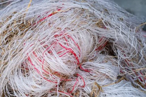 Pile of garbage, plastic threads of packing material in a large pile. many co Stock Photos