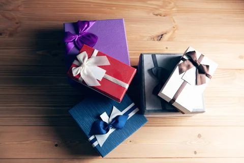 A pile of gift boxes on the table Stock Photos