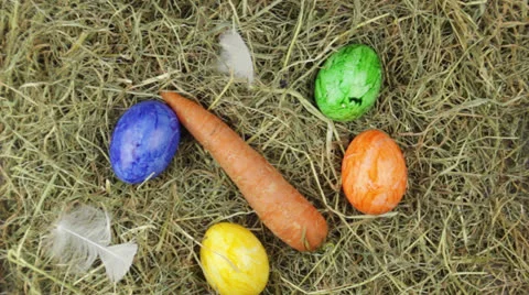 A pile of hay with easter eggs Stock Footage 24868686
