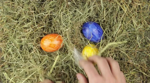 A pile of hay with easter eggs Stock Footage 24868873