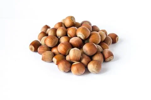 Pile of hazelnuts isolated on white background Stock Photos