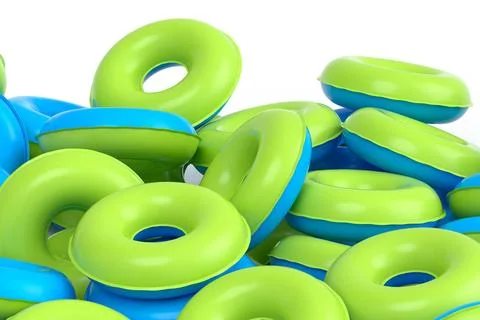 Pile of inflatable ring for swimming pool isolated on white background Illustrazione stock