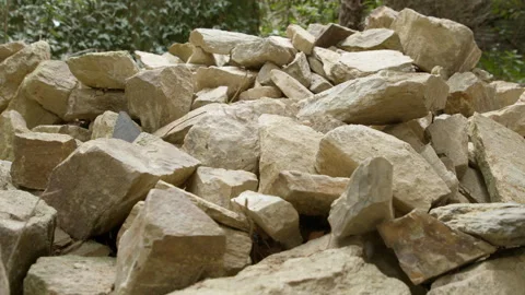 Pile Of Large Limestone Rocks For Construction. Close-up Shot Stock Footage 329596763