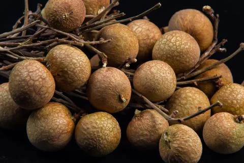 A pile of lychee on a black background Foto stock